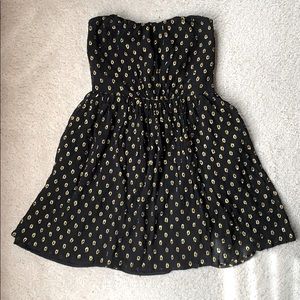Black and gold strapless mini dress